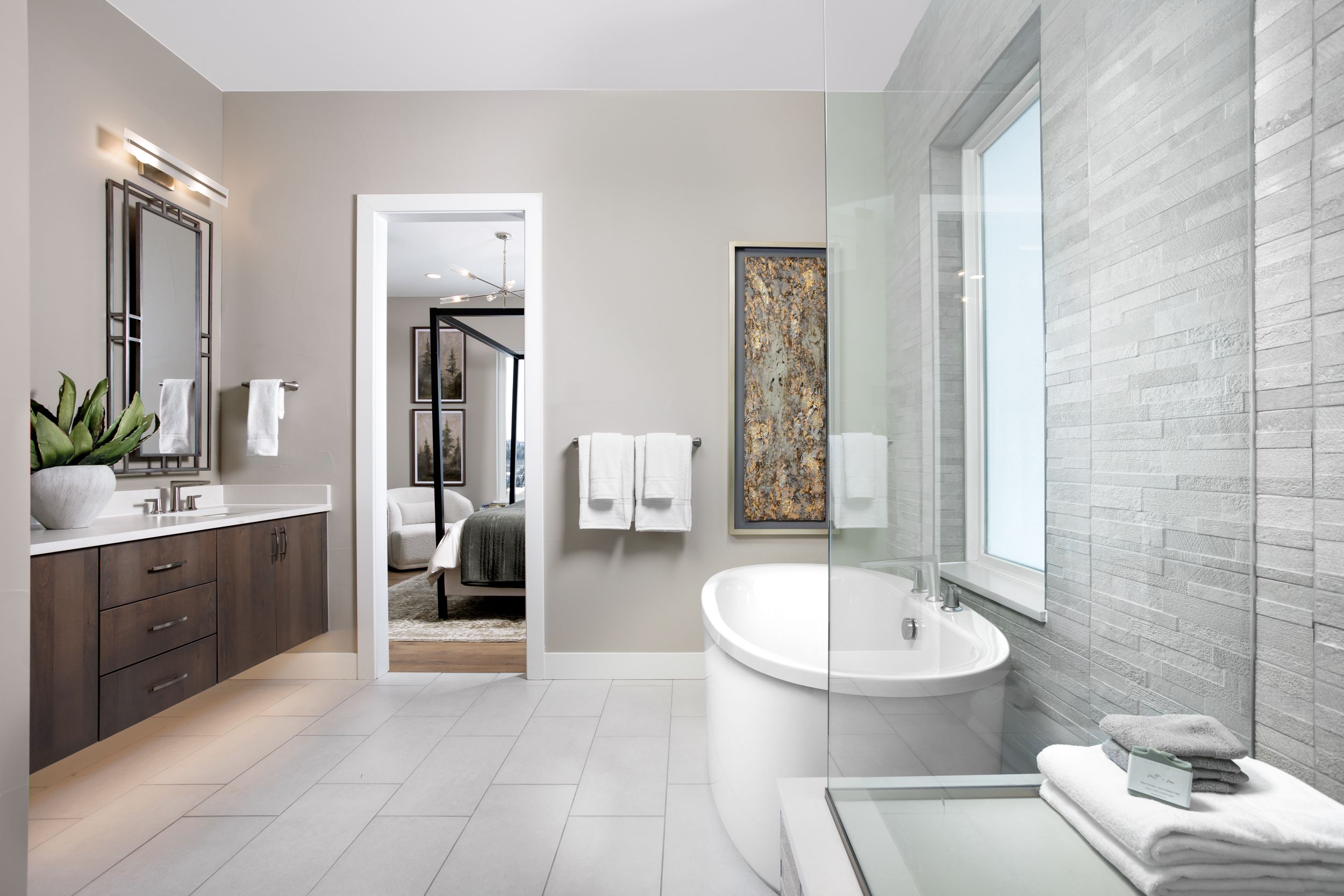 Primary Bath 1 features a spacious walk-in shower and a relaxing soaking tub, creating a serene retreat designed for comfort and everyday luxury.