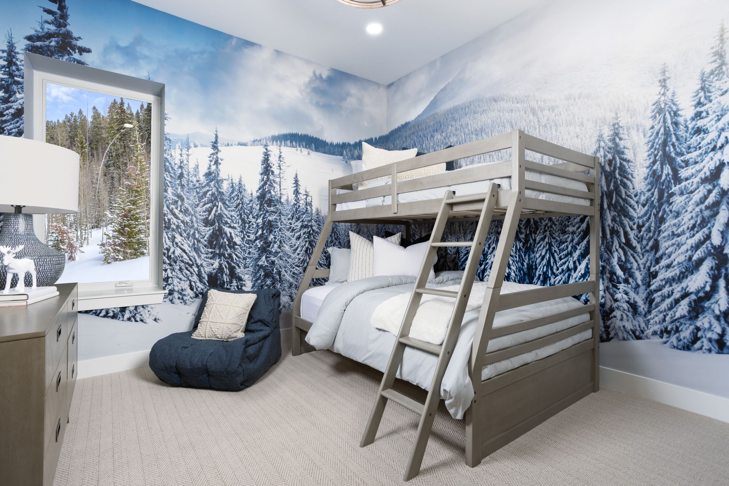 Bedroom 4 is located on the lower level of the home and features a spacious closet, offering a comfortable and functional retreat ideal for guests or flexible living needs.