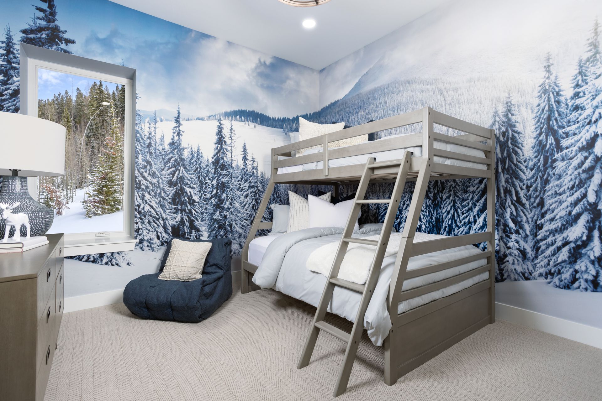 Bedroom 4 is located on the lower level of the home and features a spacious closet, offering a comfortable and functional retreat ideal for guests or flexible living needs.