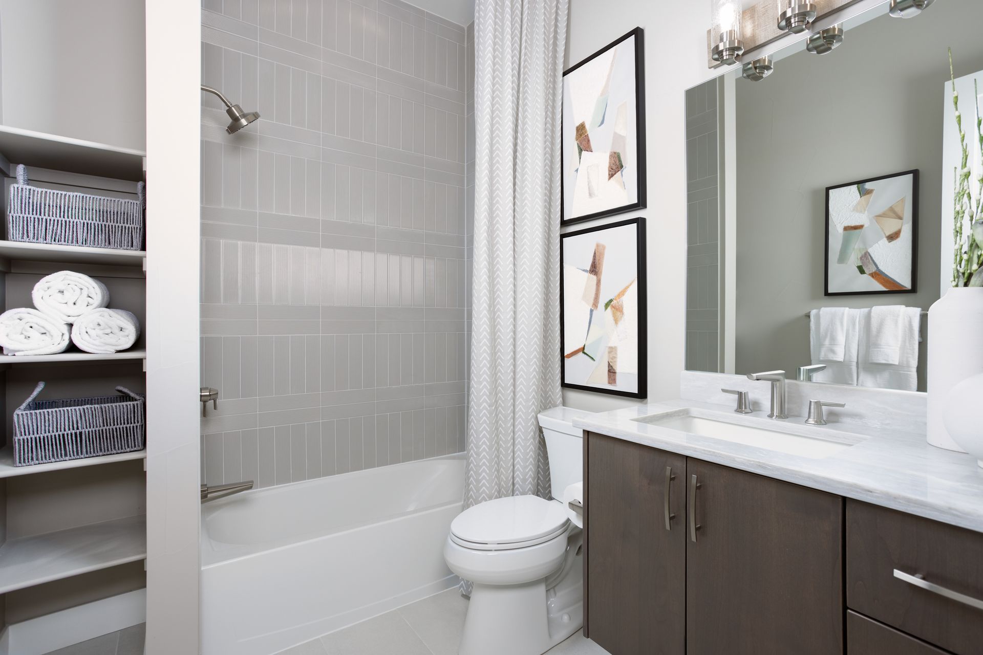 Bath 3 is a shared space on the lower level, thoughtfully designed for convenience and easy access from the surrounding bedrooms and living areas.