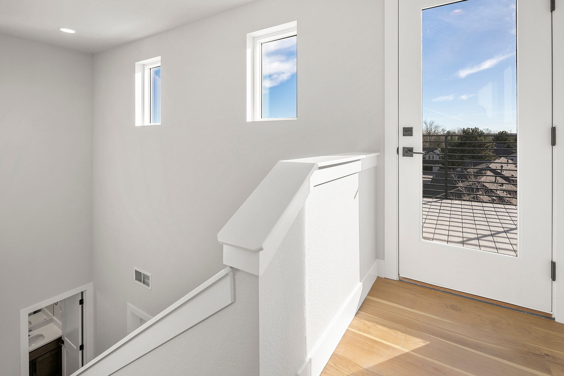 Landing leading to rooftop deck