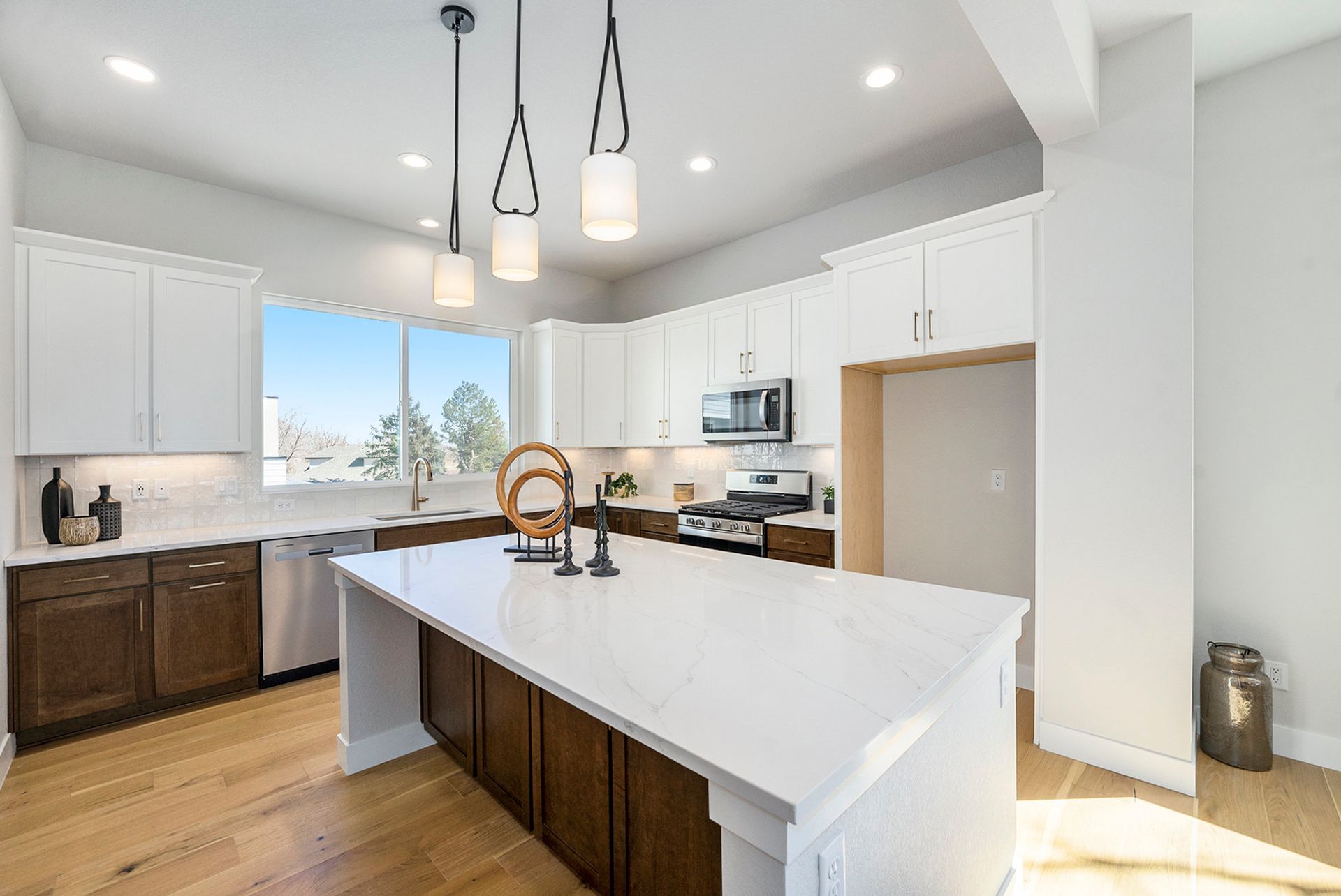 Chef's kitchen with tons of storage and large window over the sink