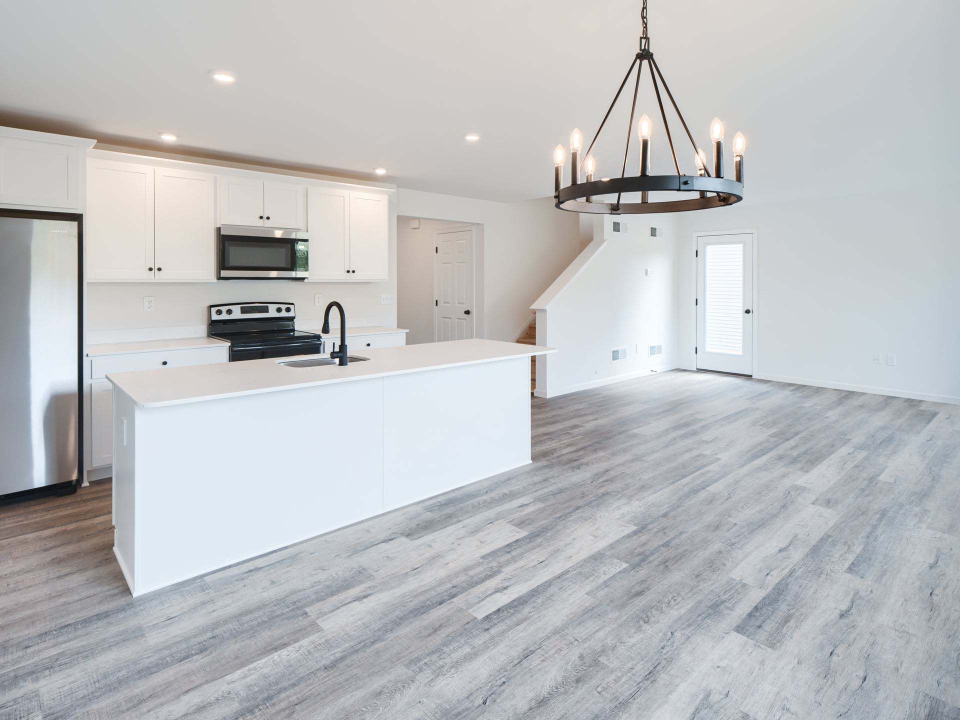 Standard Kitchen W/Upgrades, Dining Area, and Family Room