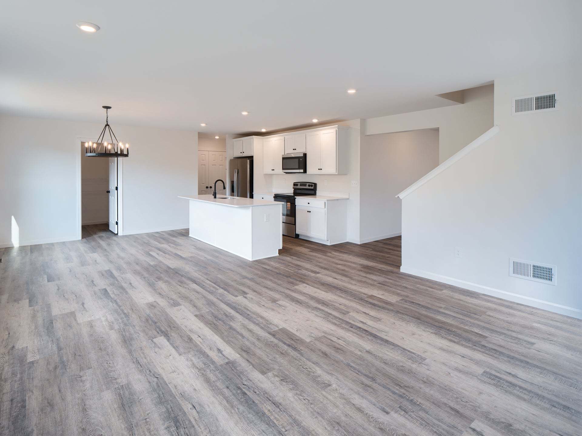 Standard Kitchen W/Upgrades, Dining Area, and Family Room