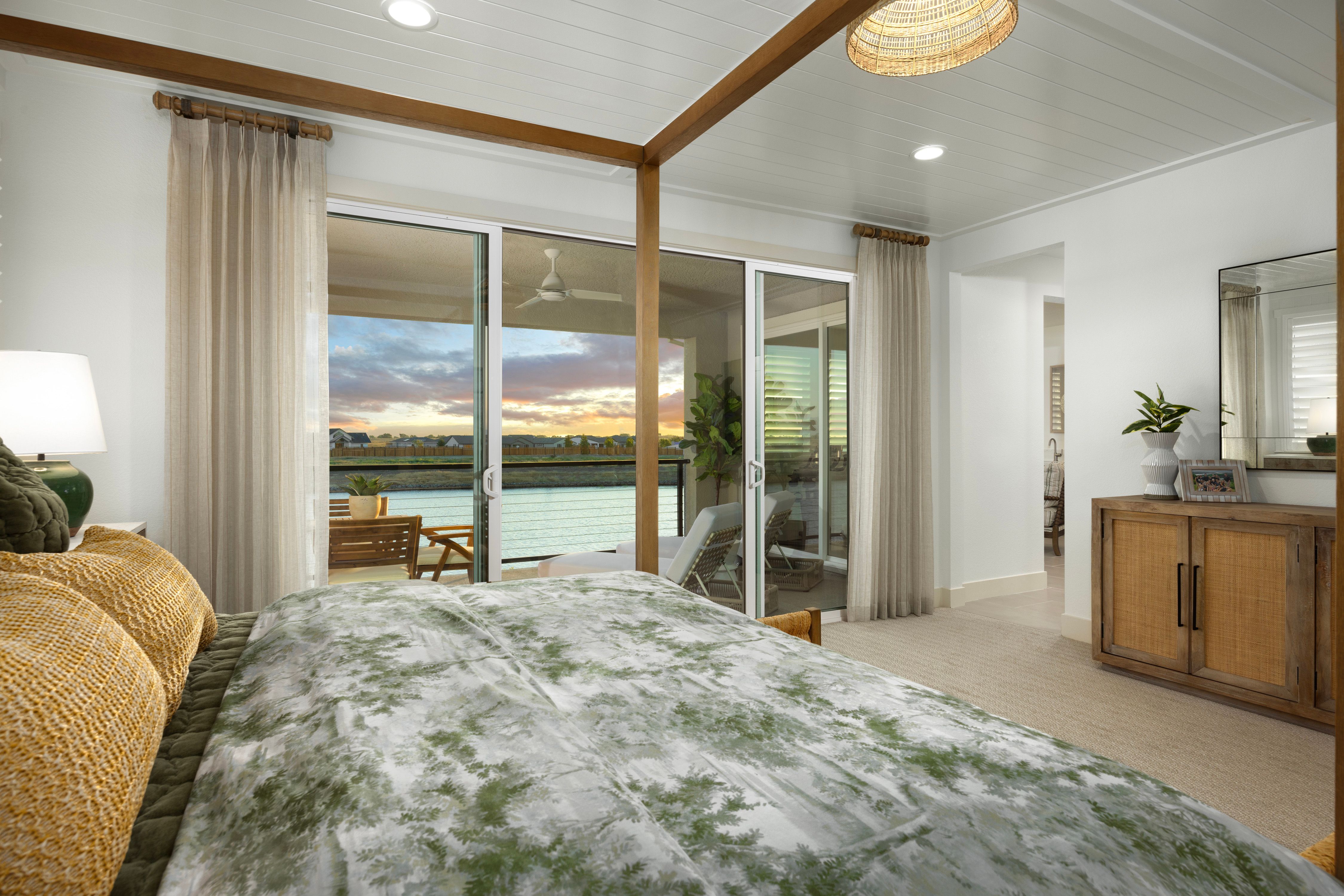 Veiw Deck off oc the Primary bedroom overlooks the lake