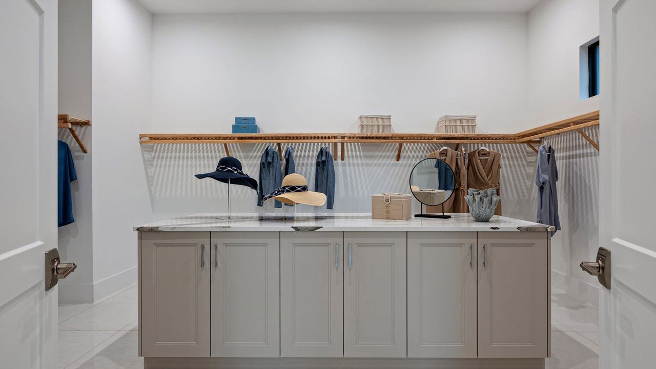 Zara Model Home | Owner's Walk-In Closet