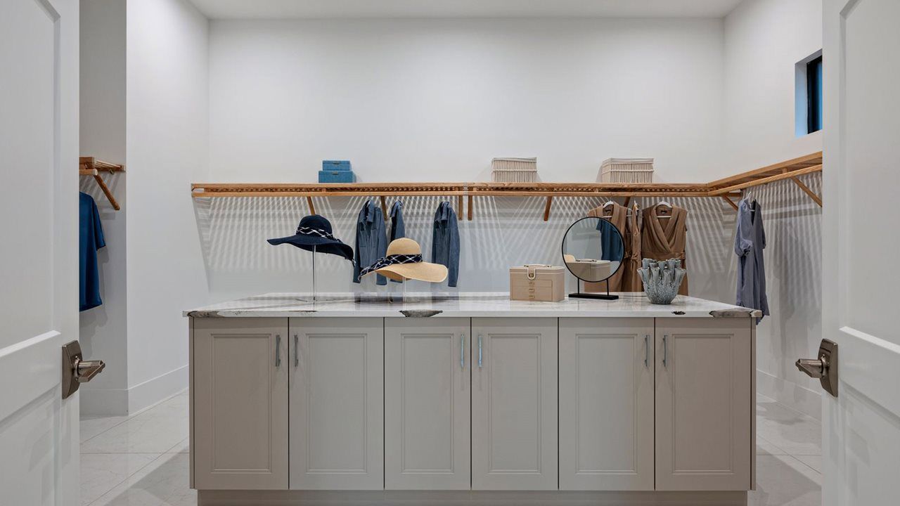 Zara Model Home | Owner's Walk-In Closet
