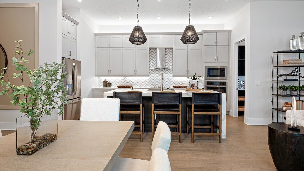 Madeline Model Home | Dining into Island Kitchen