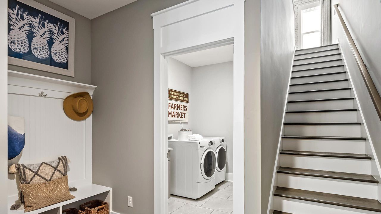 Mulberry Model Home | Laundry and Stairs to Bonus Room