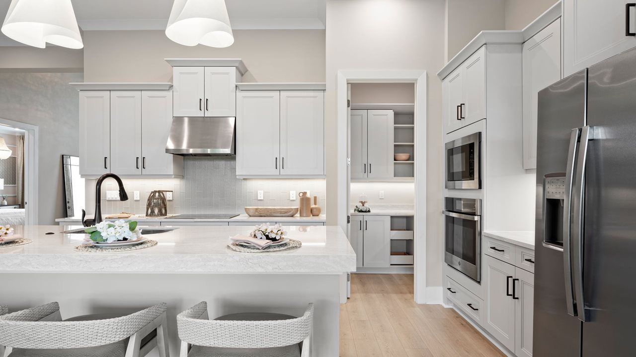 Lila Model Home | Kitchen and Great Room | Photo from sister community