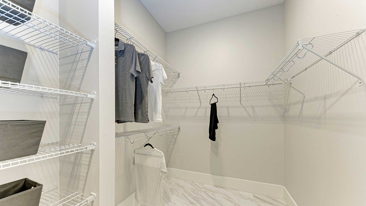 Palm Beach Model Home | Owner's Walk-In Closet