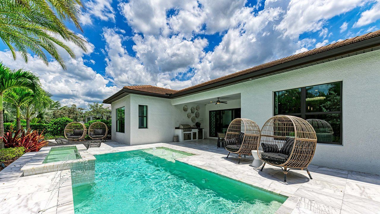 Rosemary Model Home | Pool and rear exterior