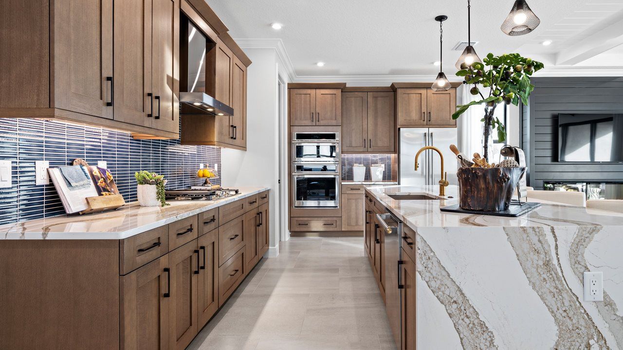 Laura Model Home | Kitchen - Model shown is from sister community