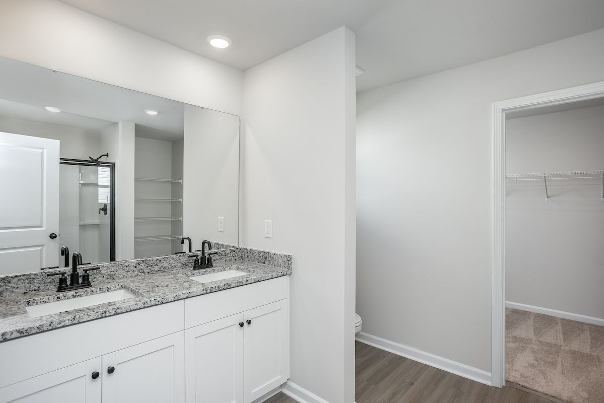 the master has an en-suite bathroom and walk-in closet. 