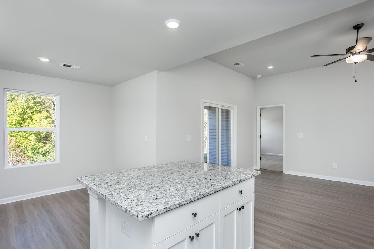 The kitchen overlooks the living area