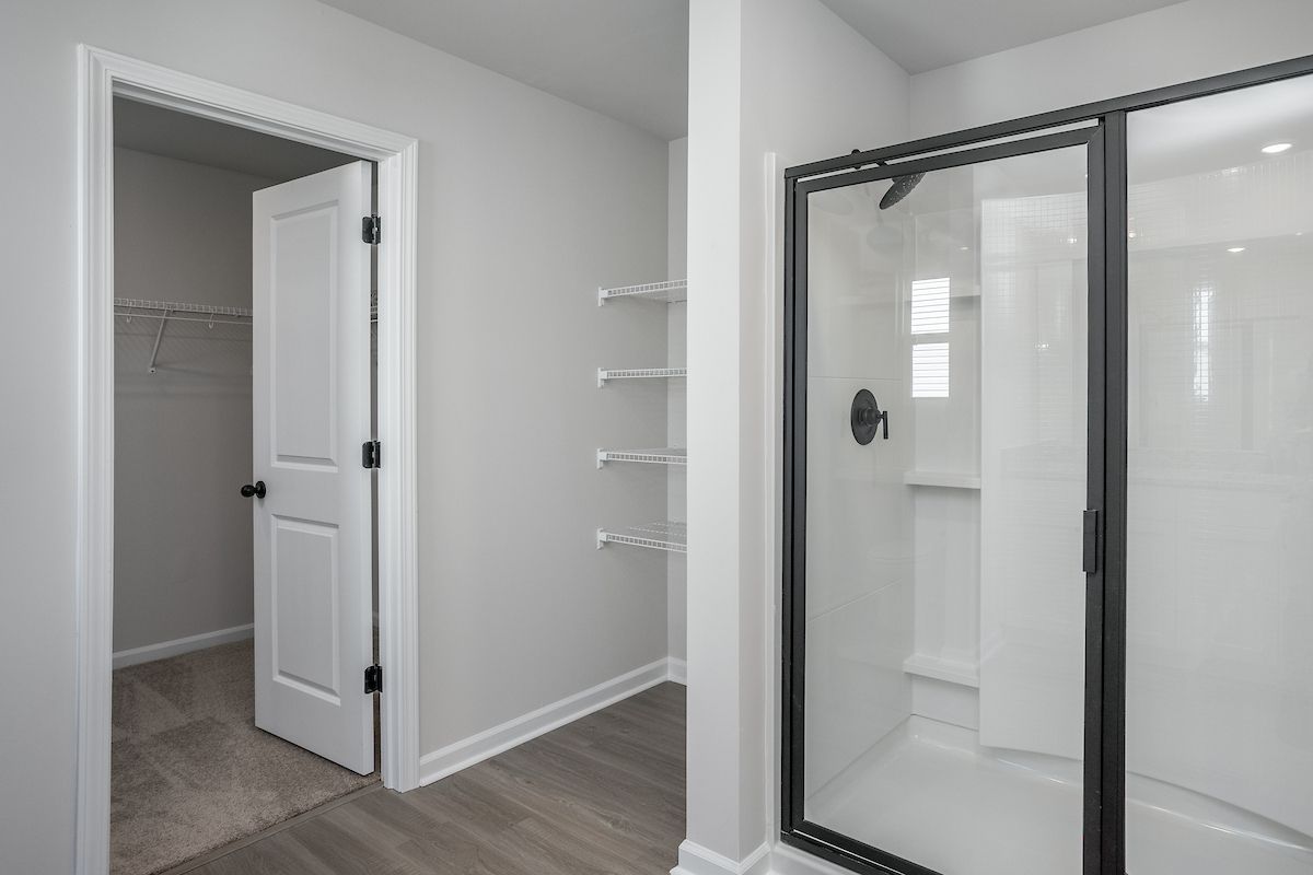 Glass-enclosed shower