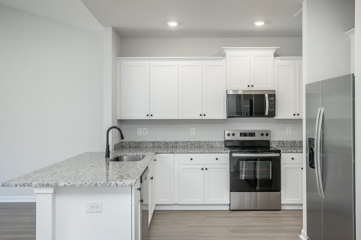 The kitchen has granite countertops