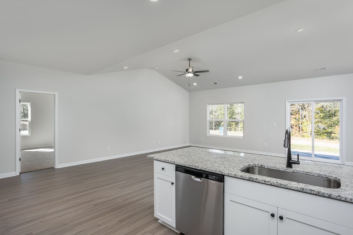 The kitchen overlooks the living area