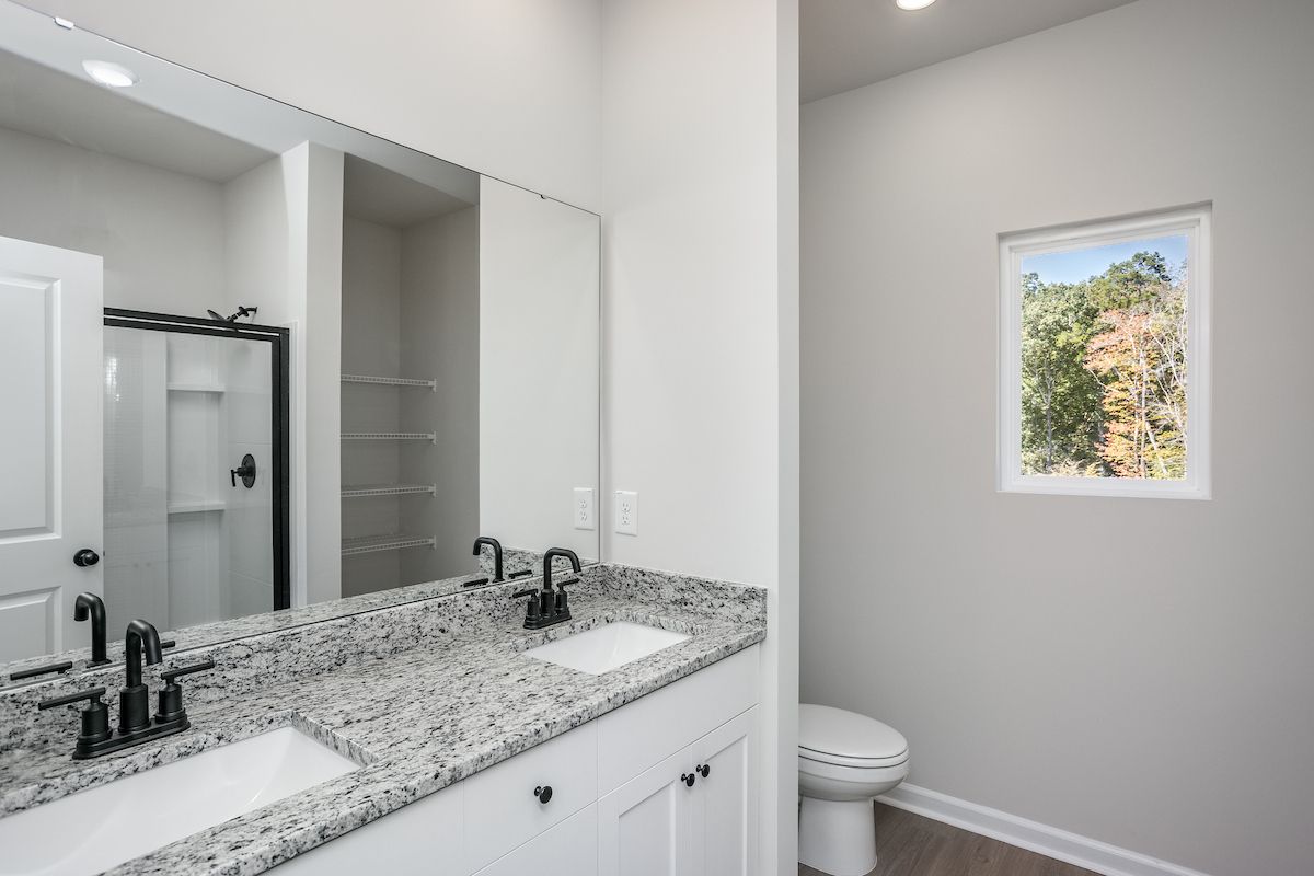 the master has an en-suite bathroom and walk-in closet. 