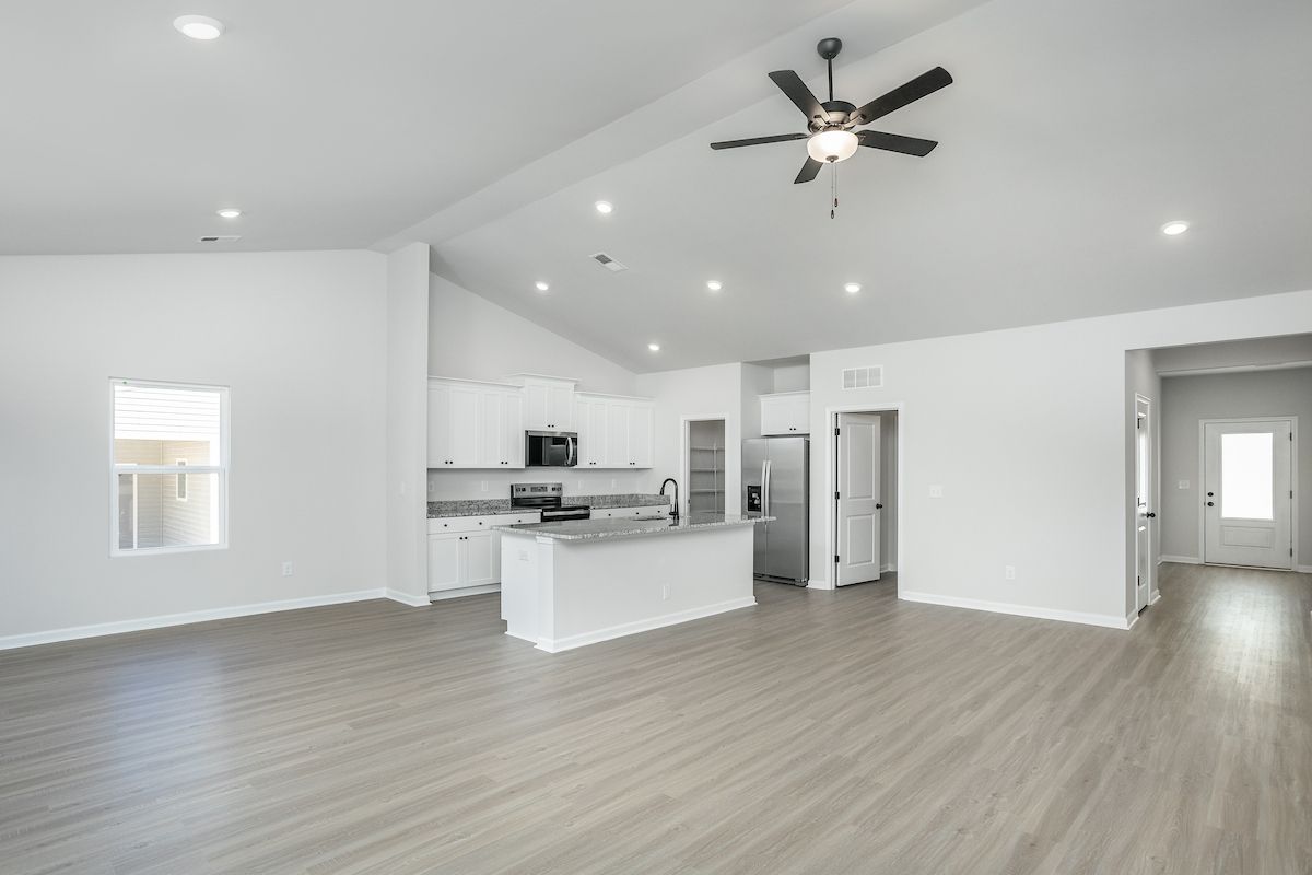 The kitchen overlooks the living area
