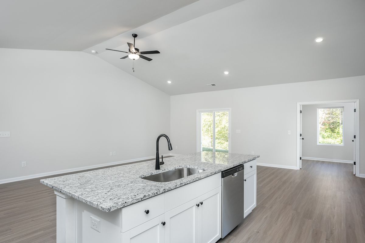 Vinyl flooring throughout.