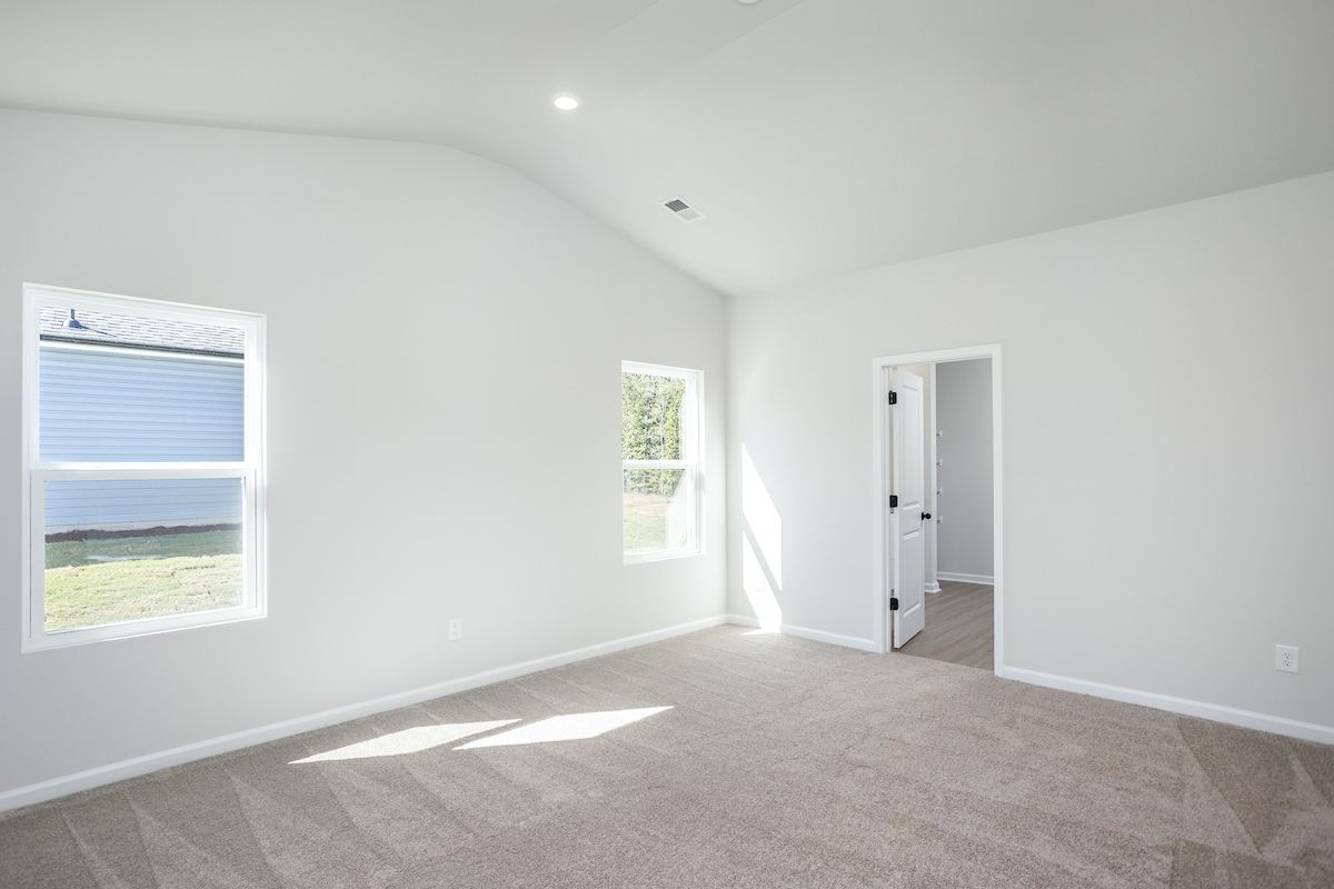 the master has an en-suite bathroom and walk-in closet. 