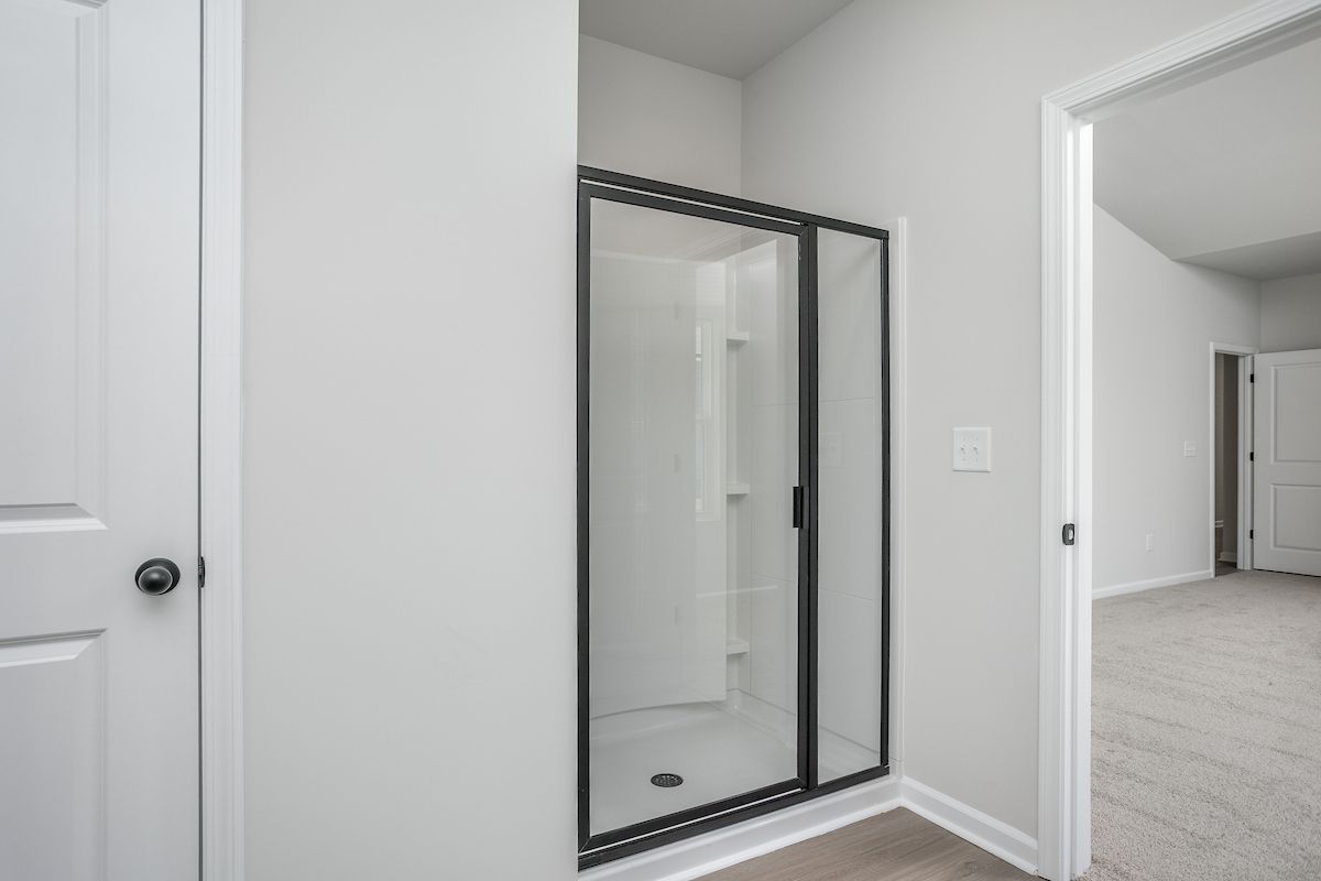 Glass-enclosed shower