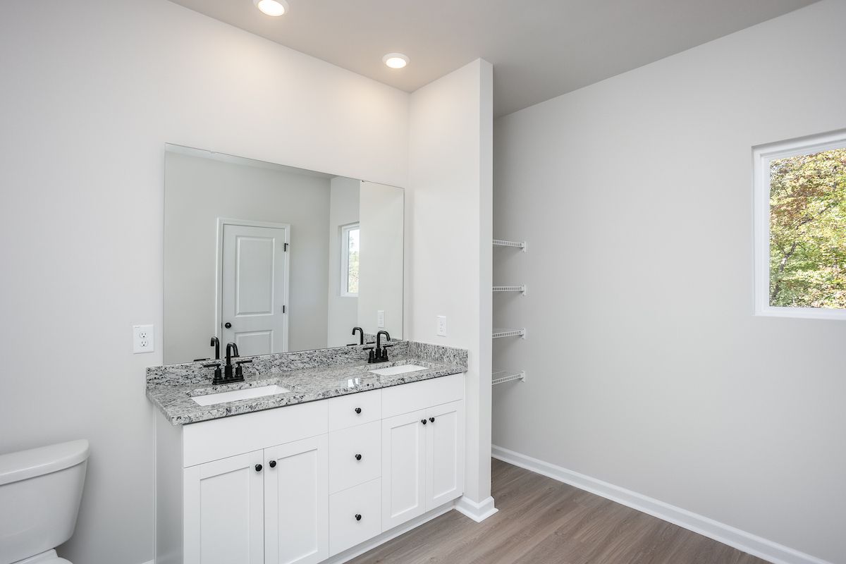 the master has an en-suite bathroom and walk-in closet. 