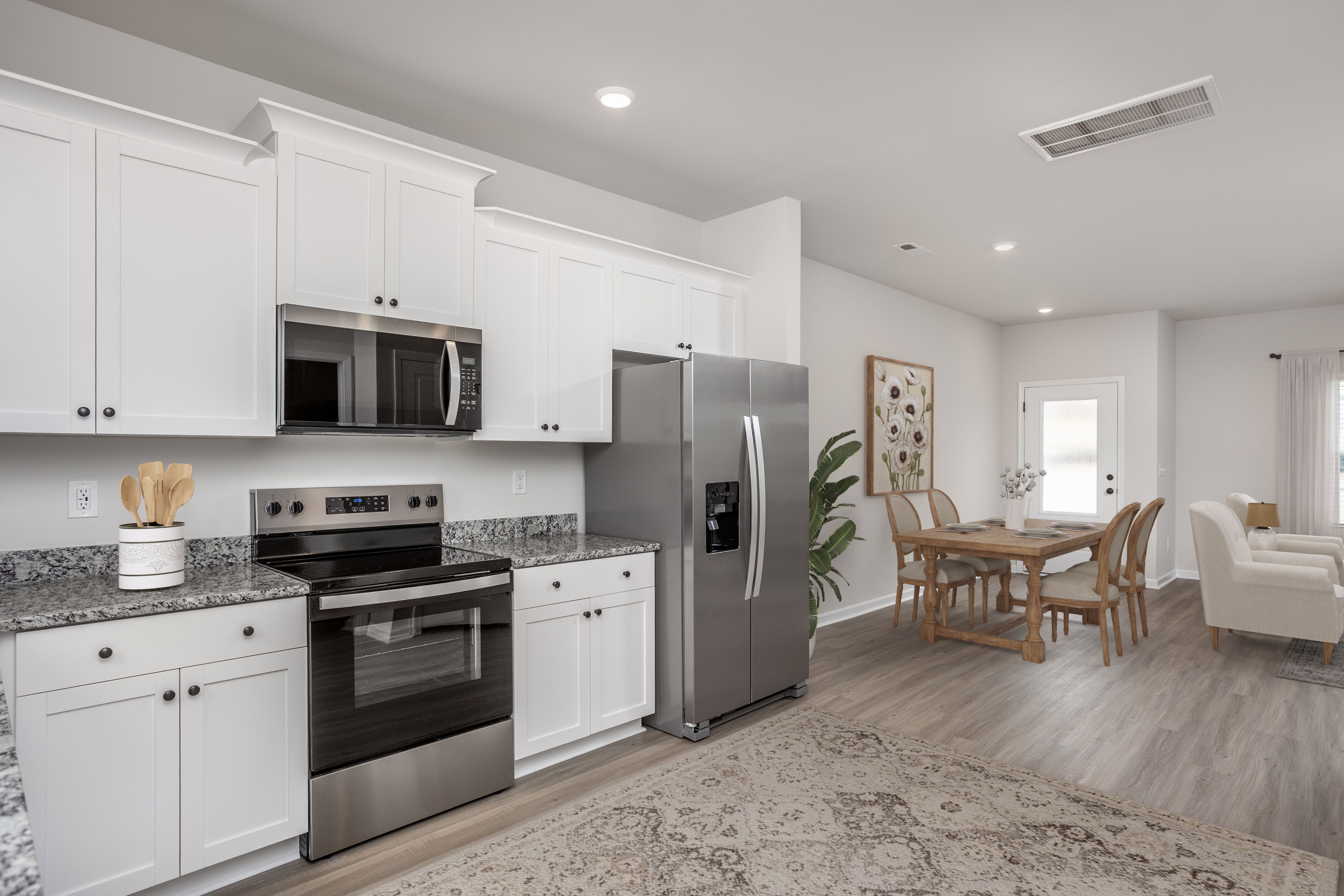 The kitchen connects to the dining room 