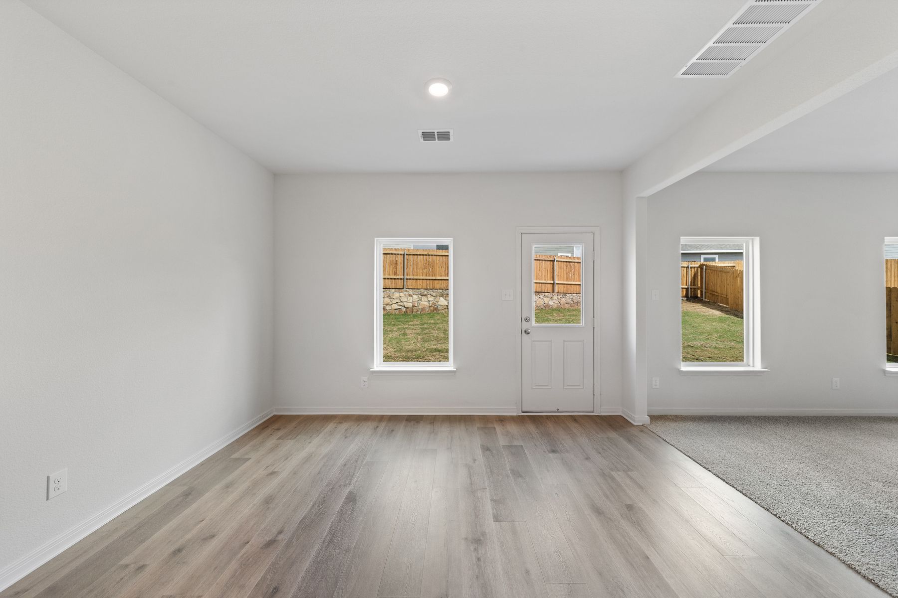 The dining room sits right off of the kitchen