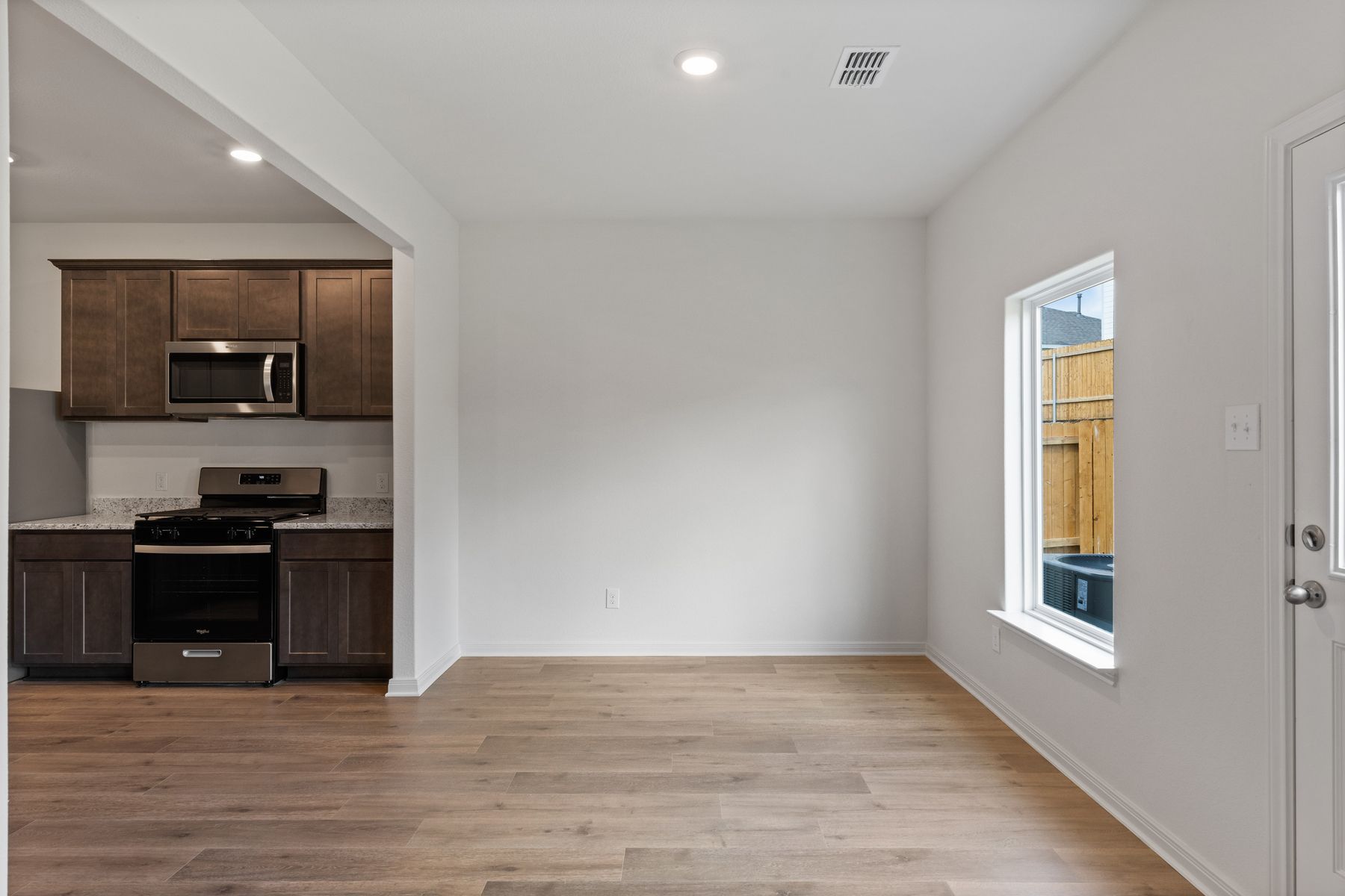 The dining room has a large window.