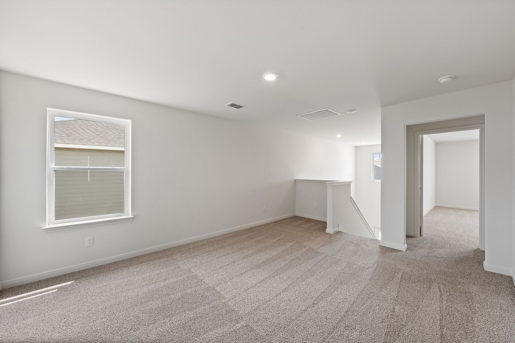 The upstairs loft is the perfect space for a gameroom.