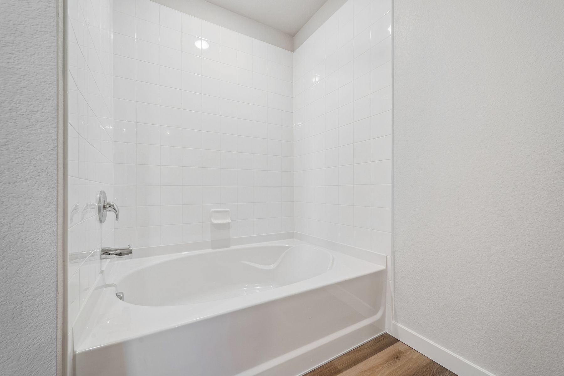 The secondary bathroom has the tub/shower combo.