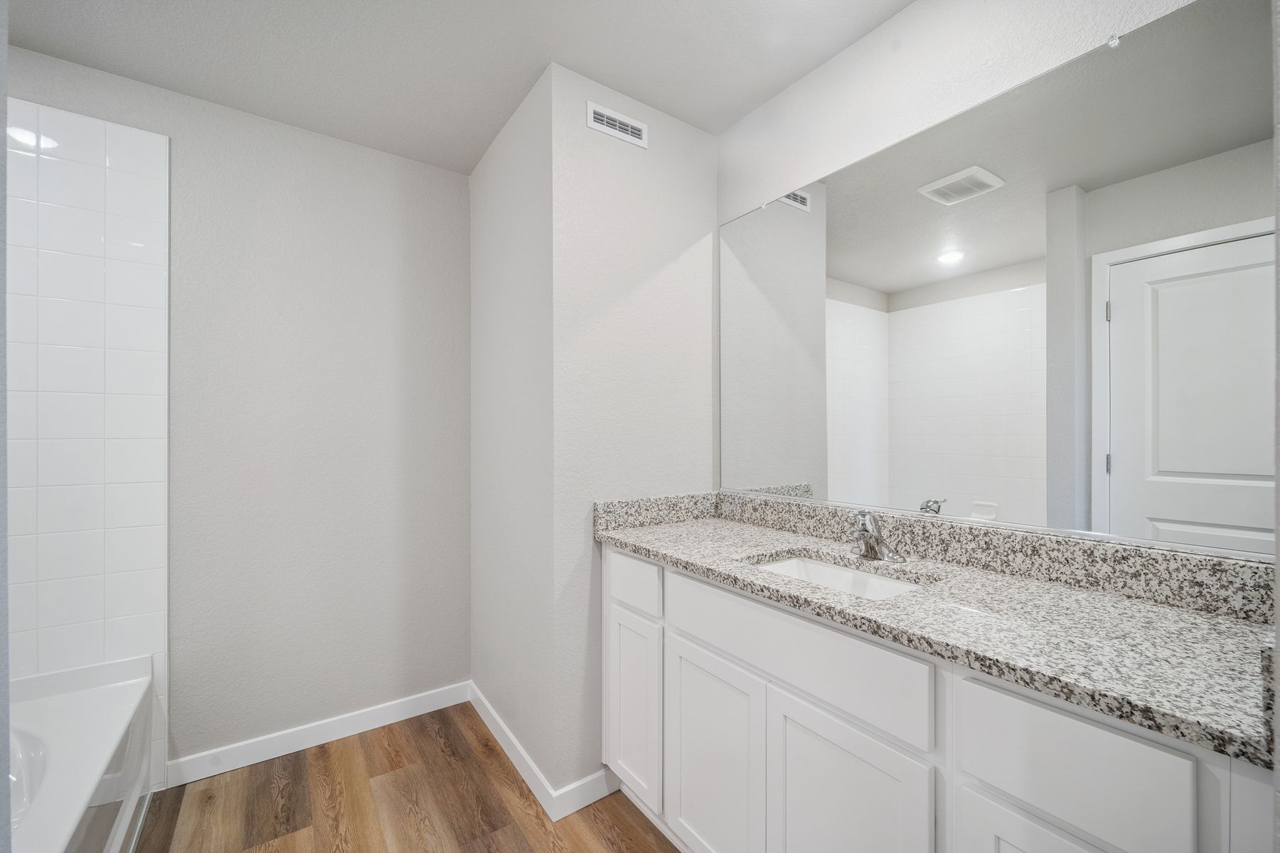 The secondary bathroom has the tub/shower combo.