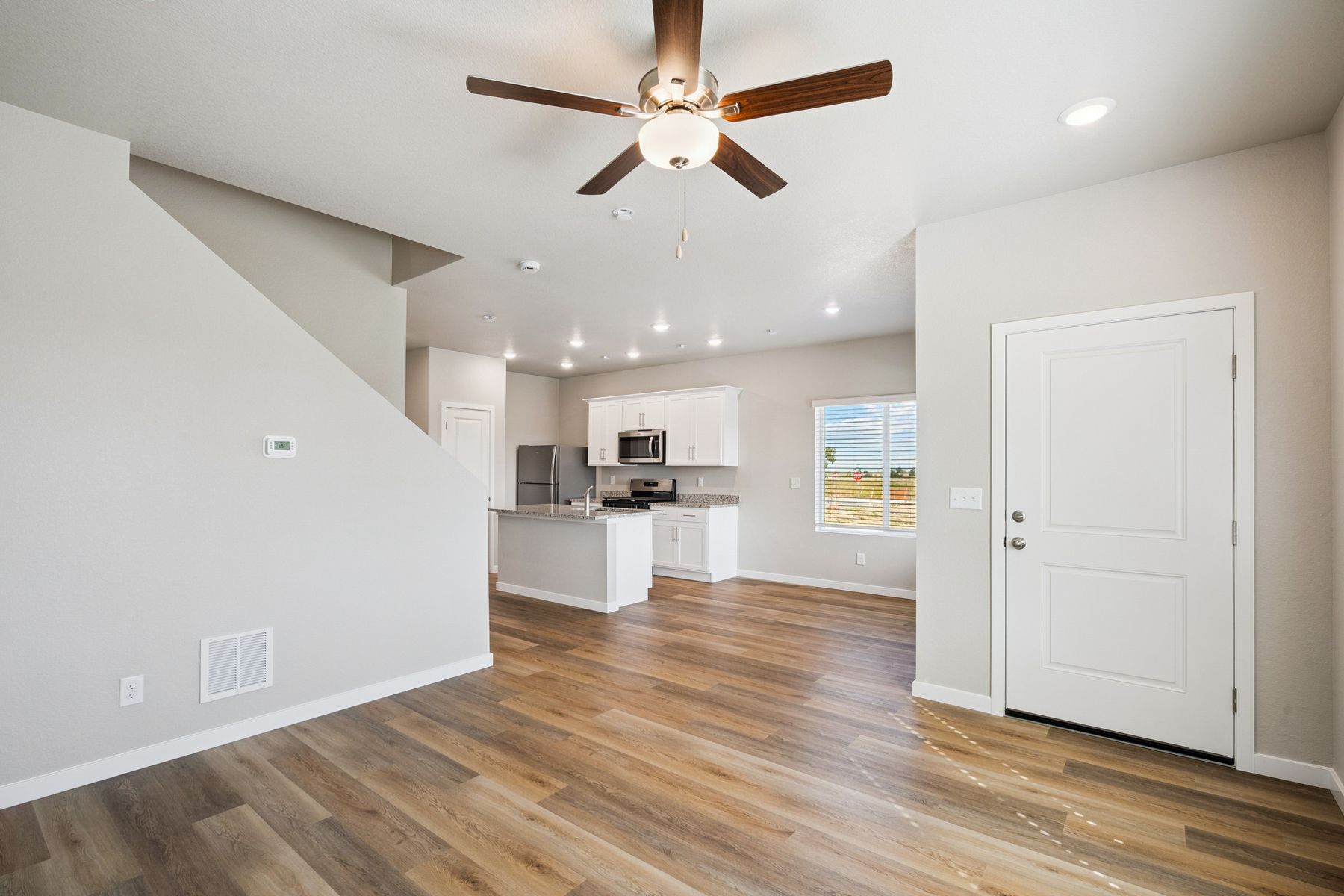 The family room is open to the kitchen and dining room.