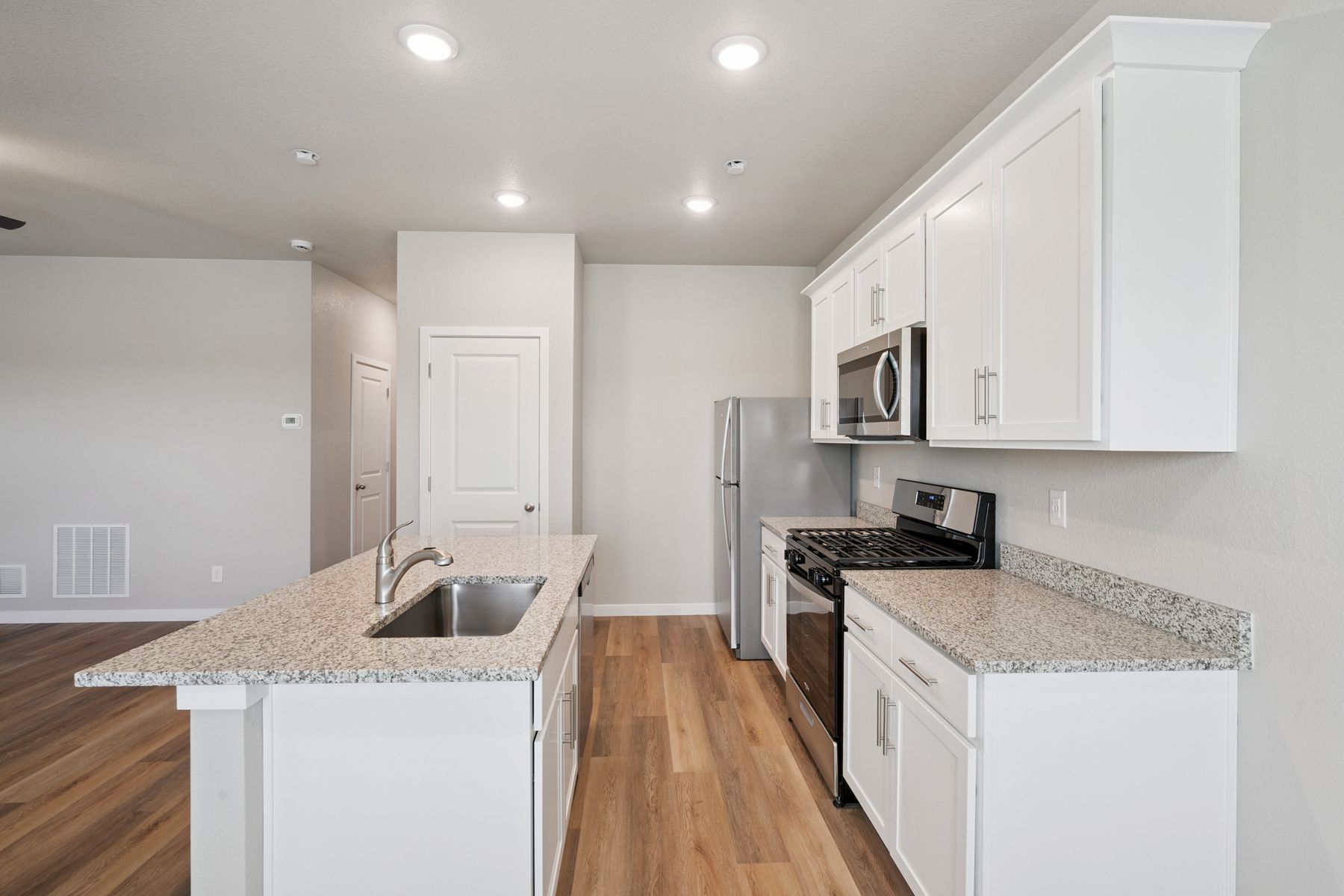 The kitchen appliances come included in this home.