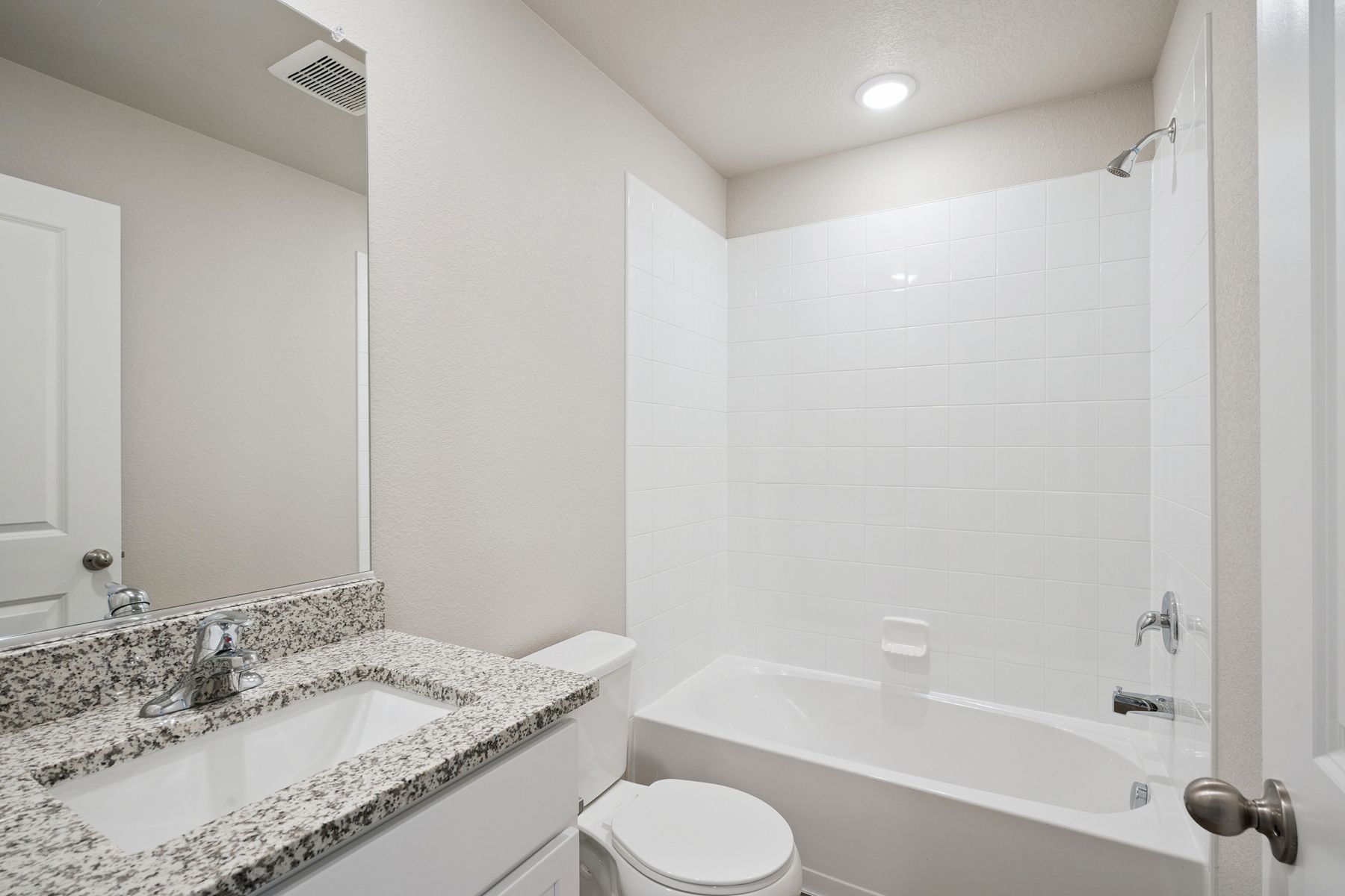The secondary bathroom has the tub/shower combo.