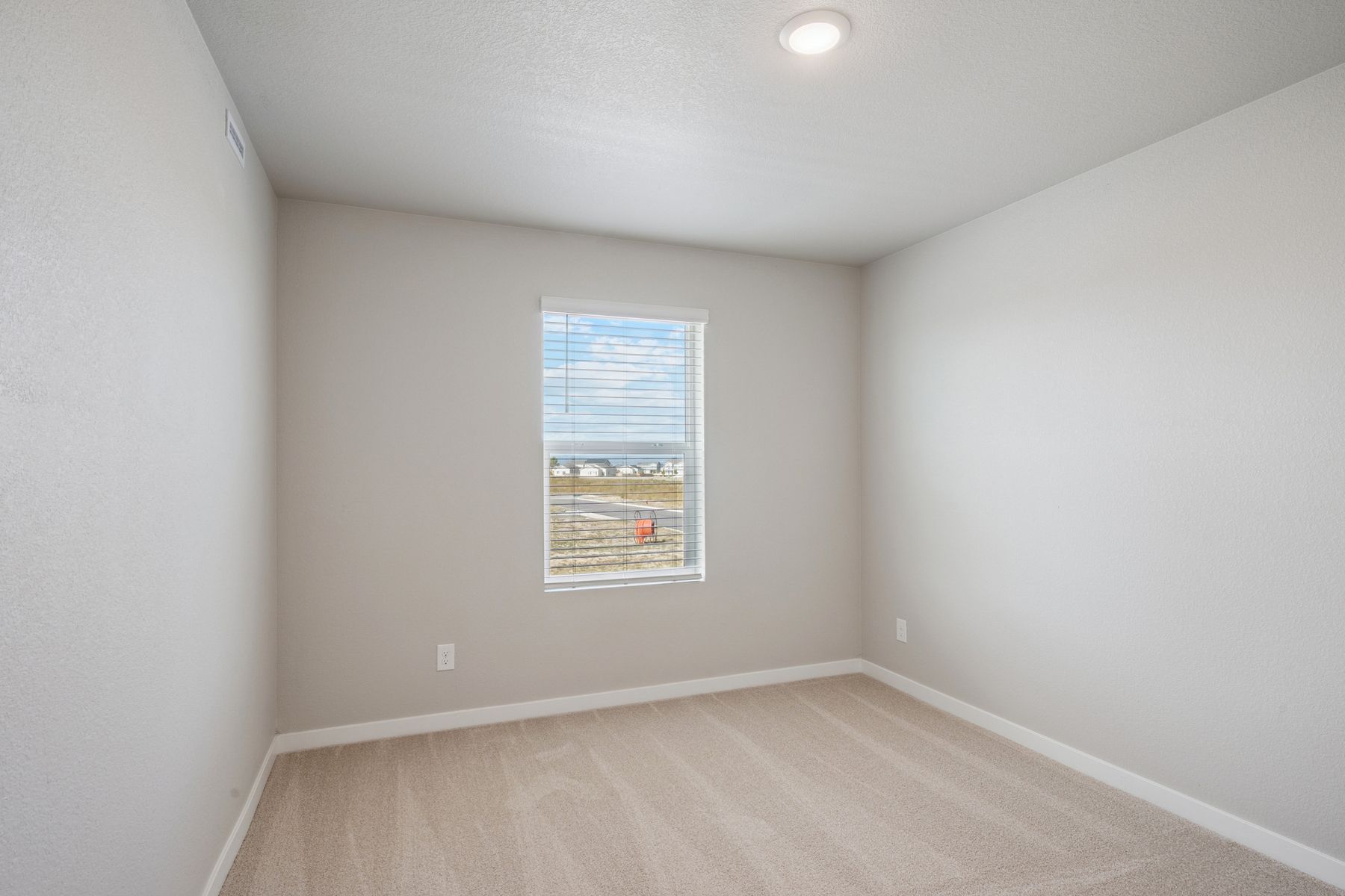 The secondary bedrooms have carpet.