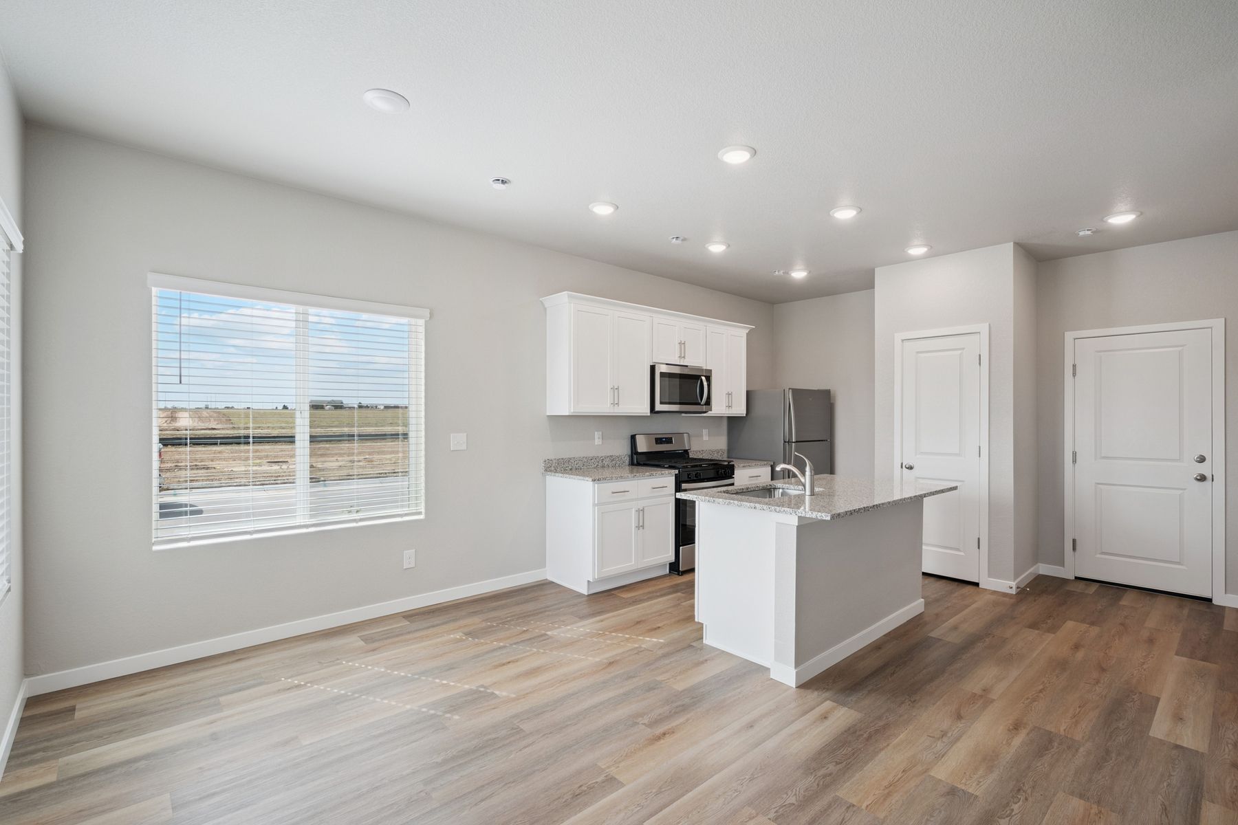 The kitchen is open to the dining room.