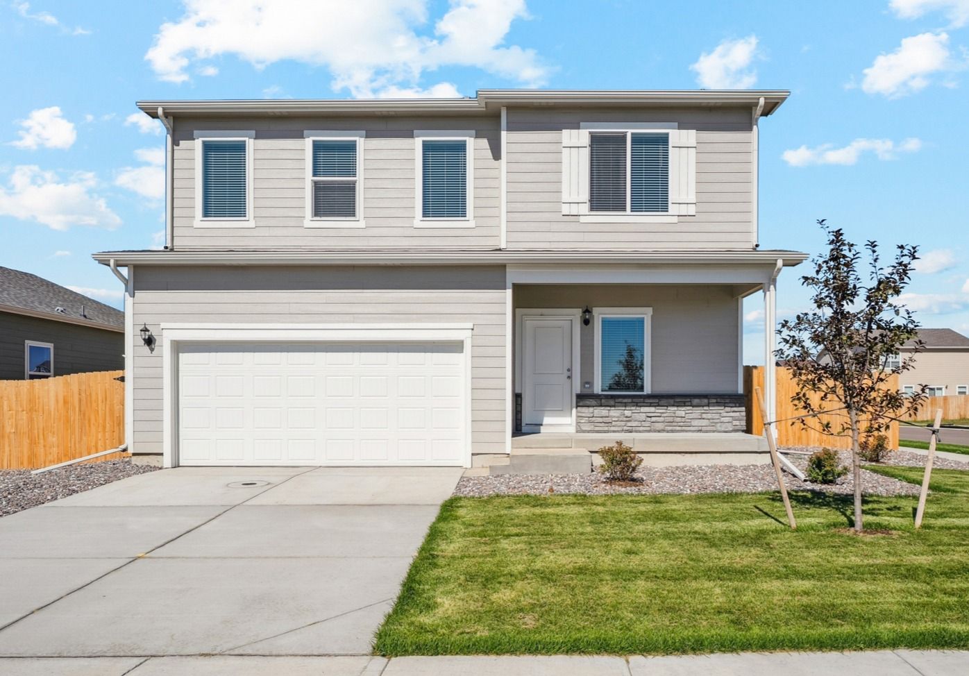 The Yale floor plan is a beautiful two-story home with three bedrooms and two and a half bathrooms.