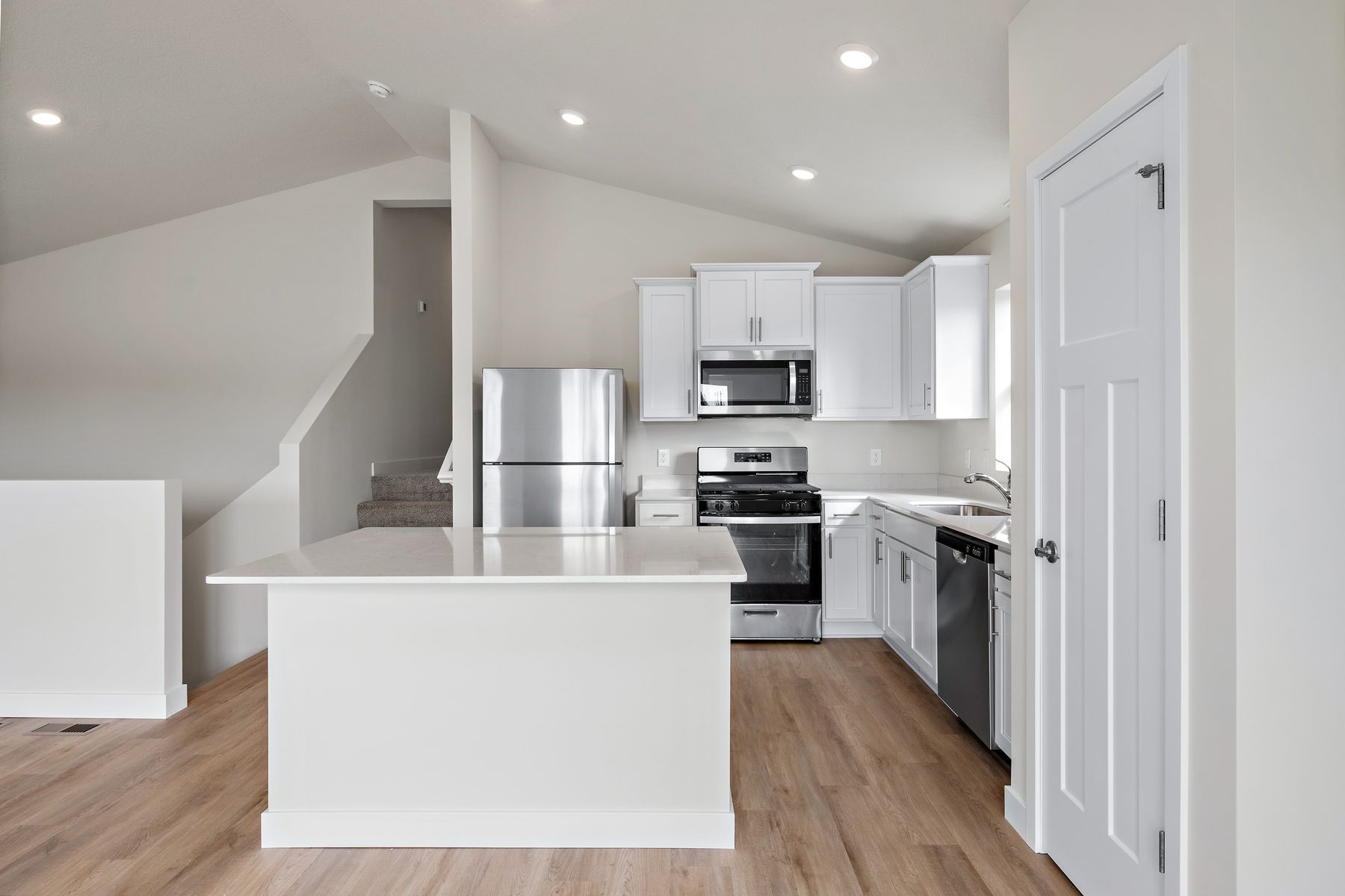 The kitchen appliances come included in this home.