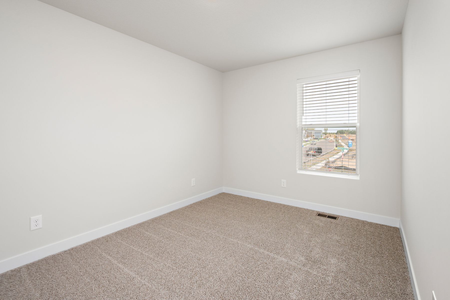 The secondary bedrooms have carpet.