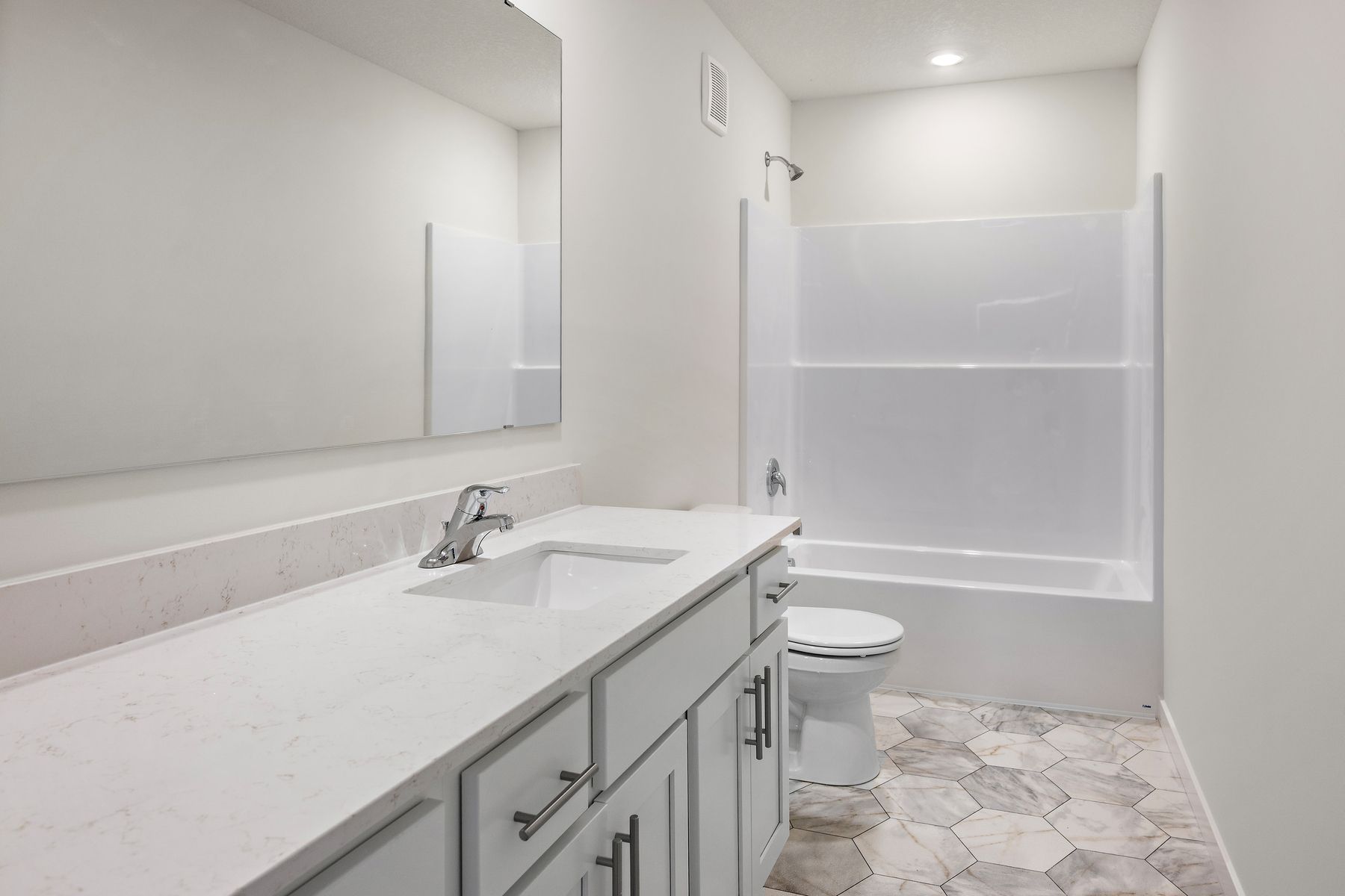 The secondary bathroom has the tub/shower combo.
