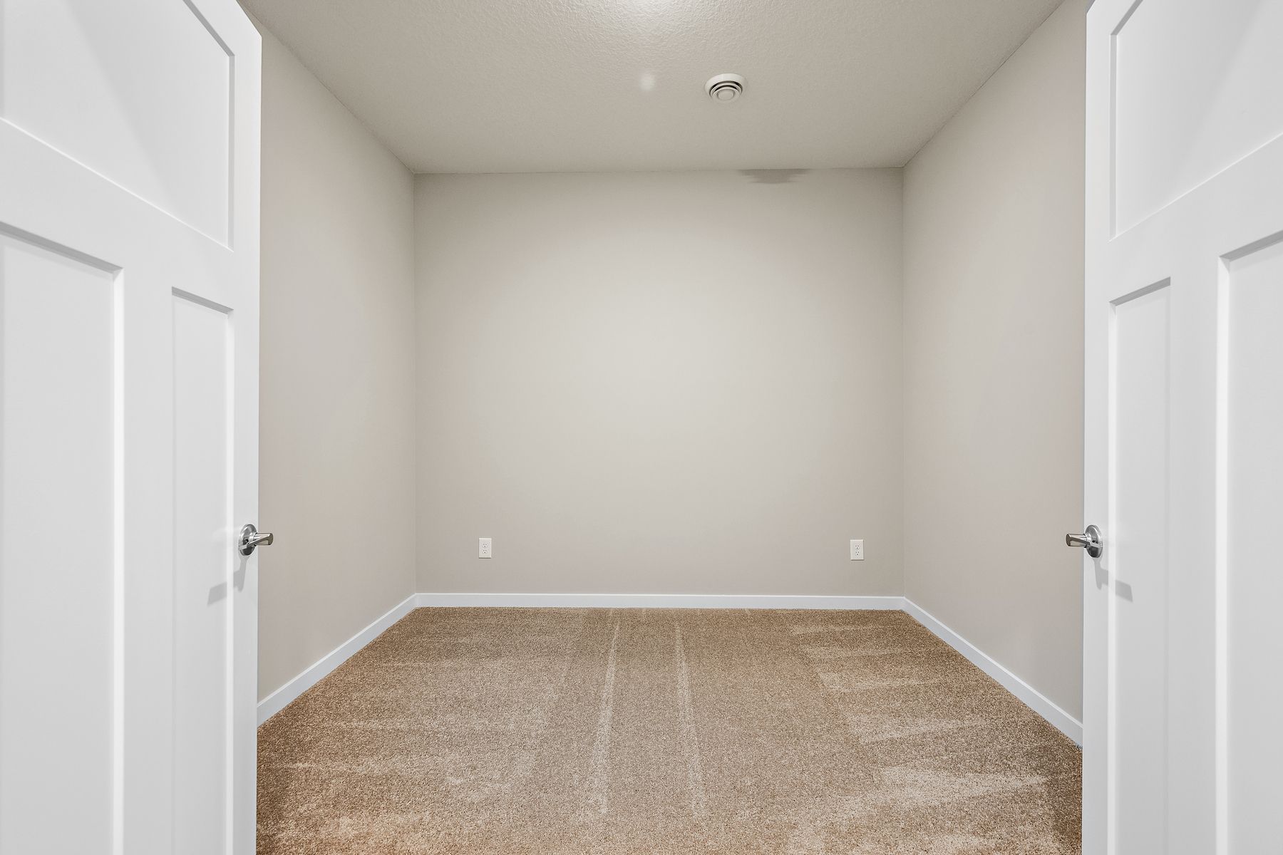 There is a flex room off the foyer.