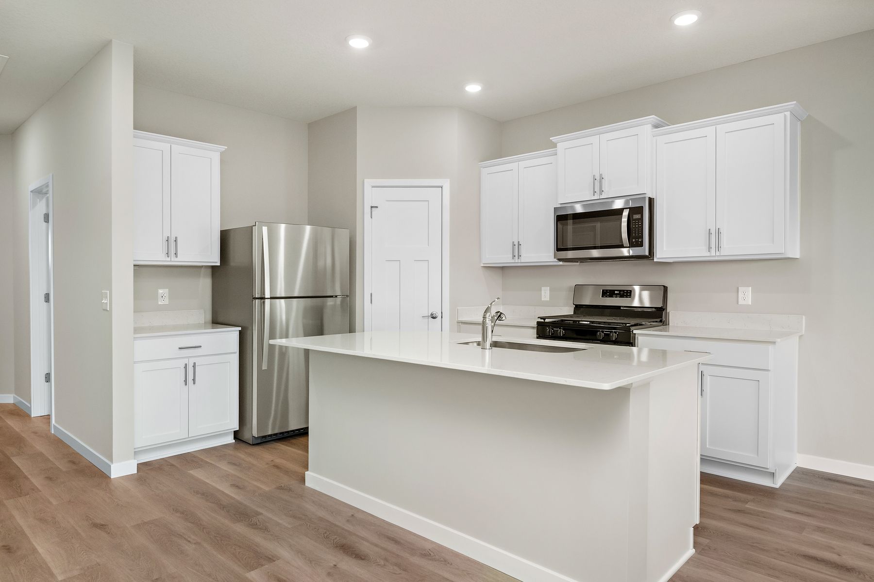 The kitchen appliances come included in this home.