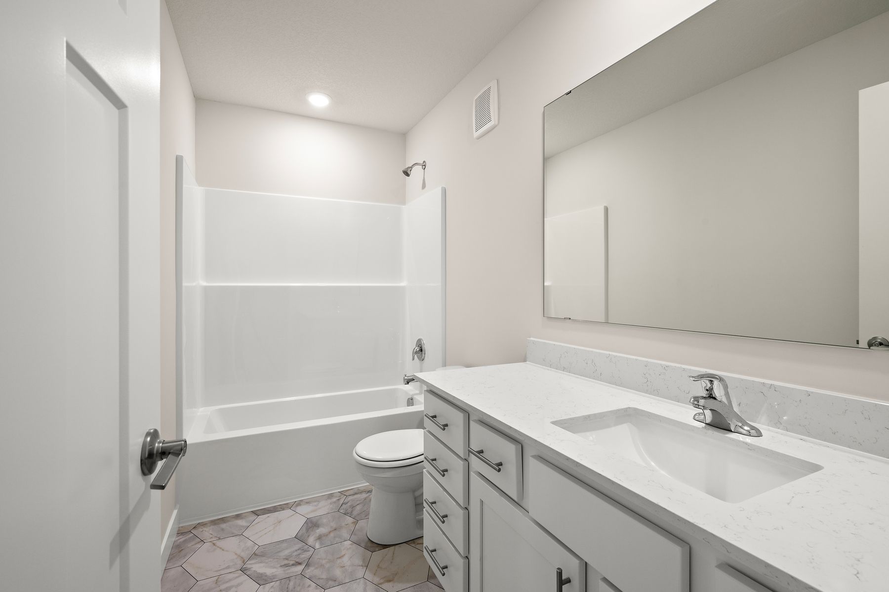 The secondary bathroom has the tub/shower combo.
