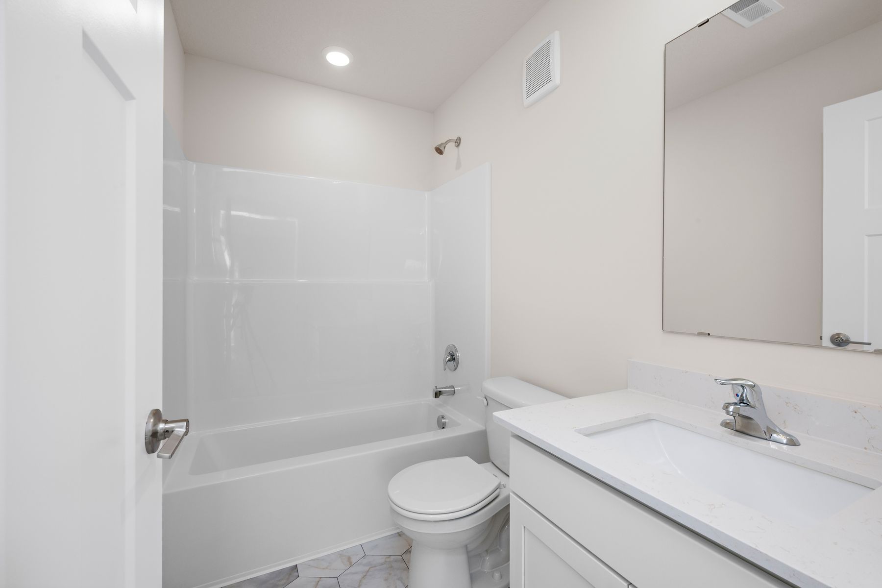 The secondary bathroom has the tub/shower combo.