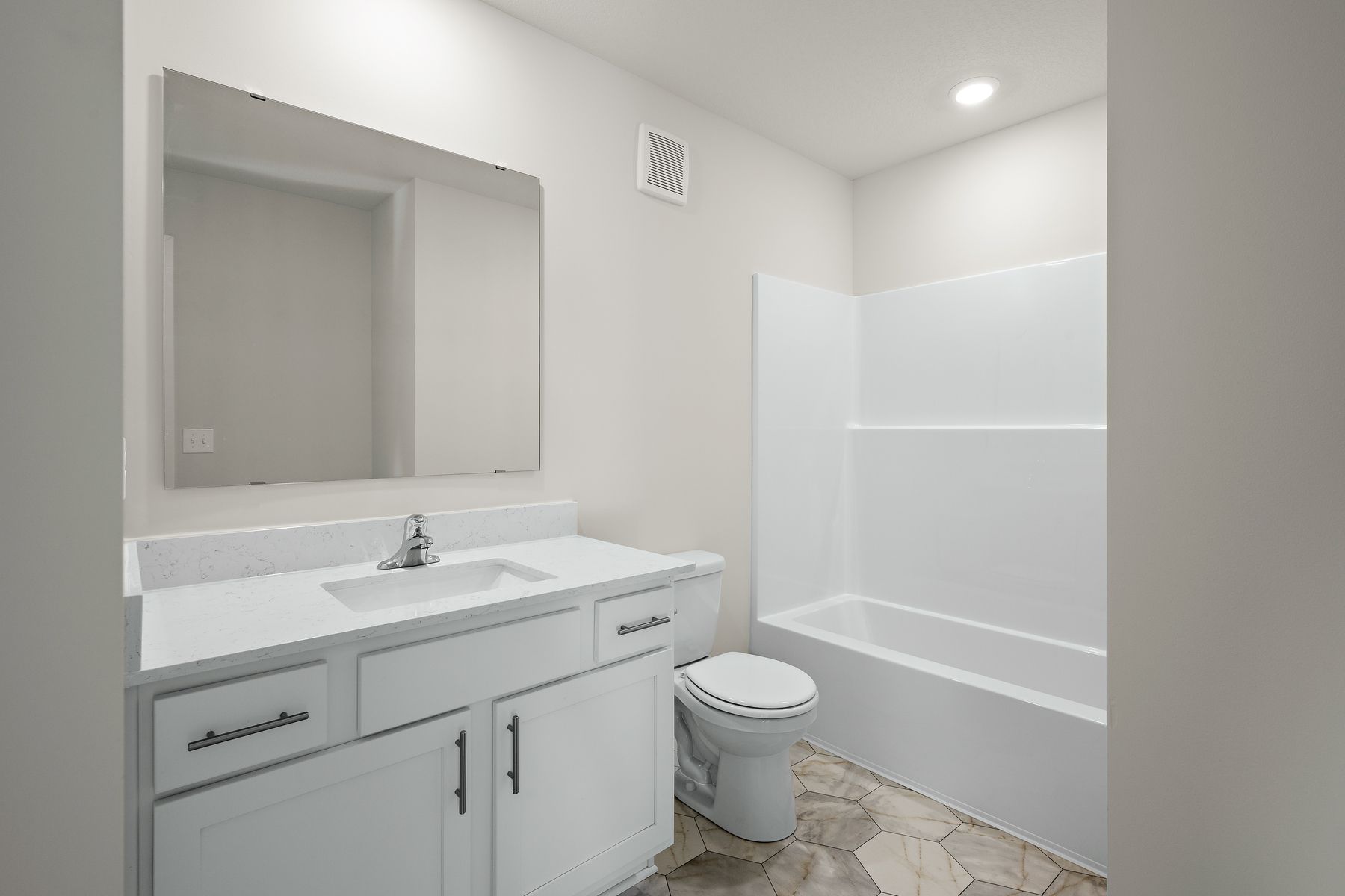 The secondary bathroom has the tub/shower combo.