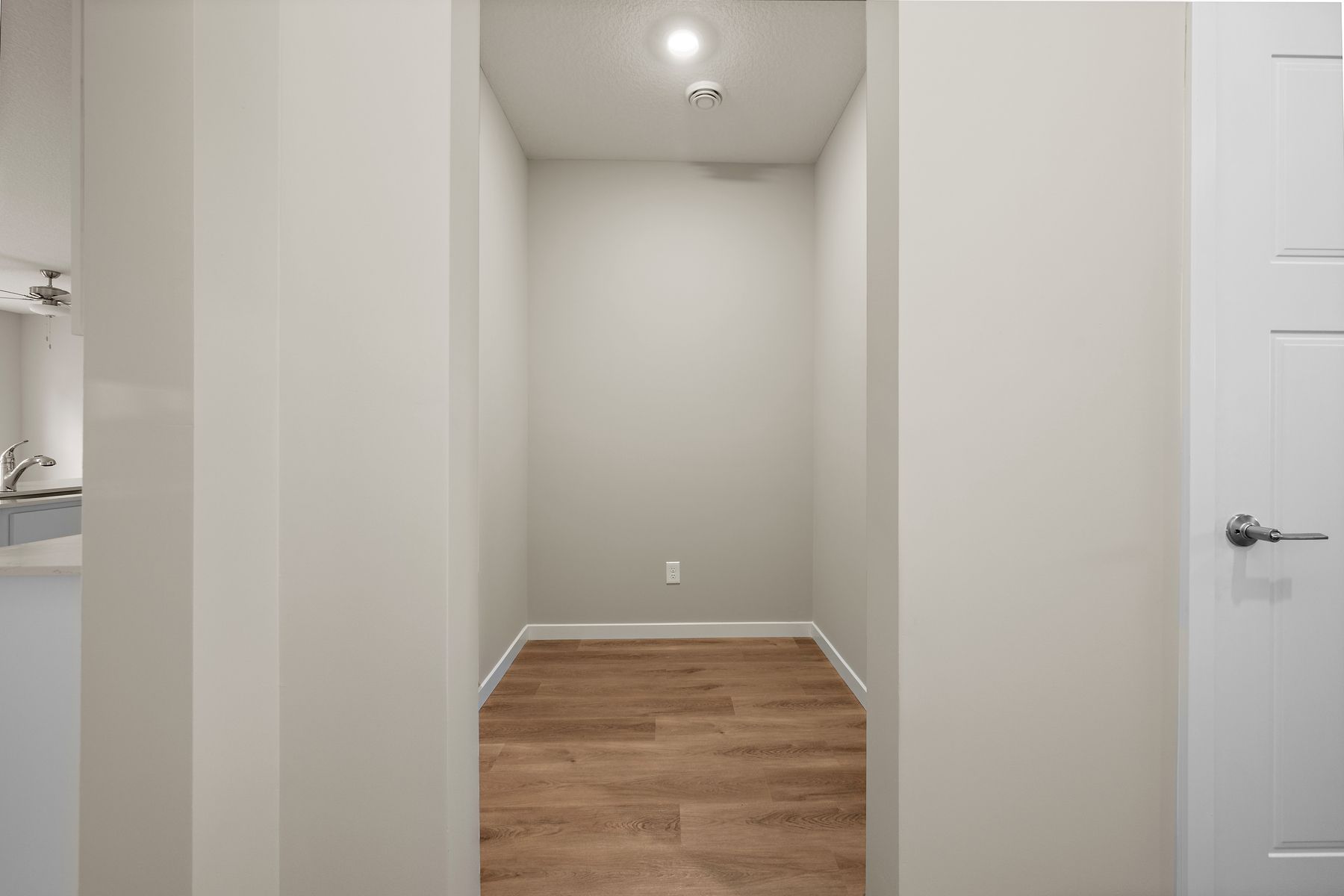 There is a flex room off the foyer.