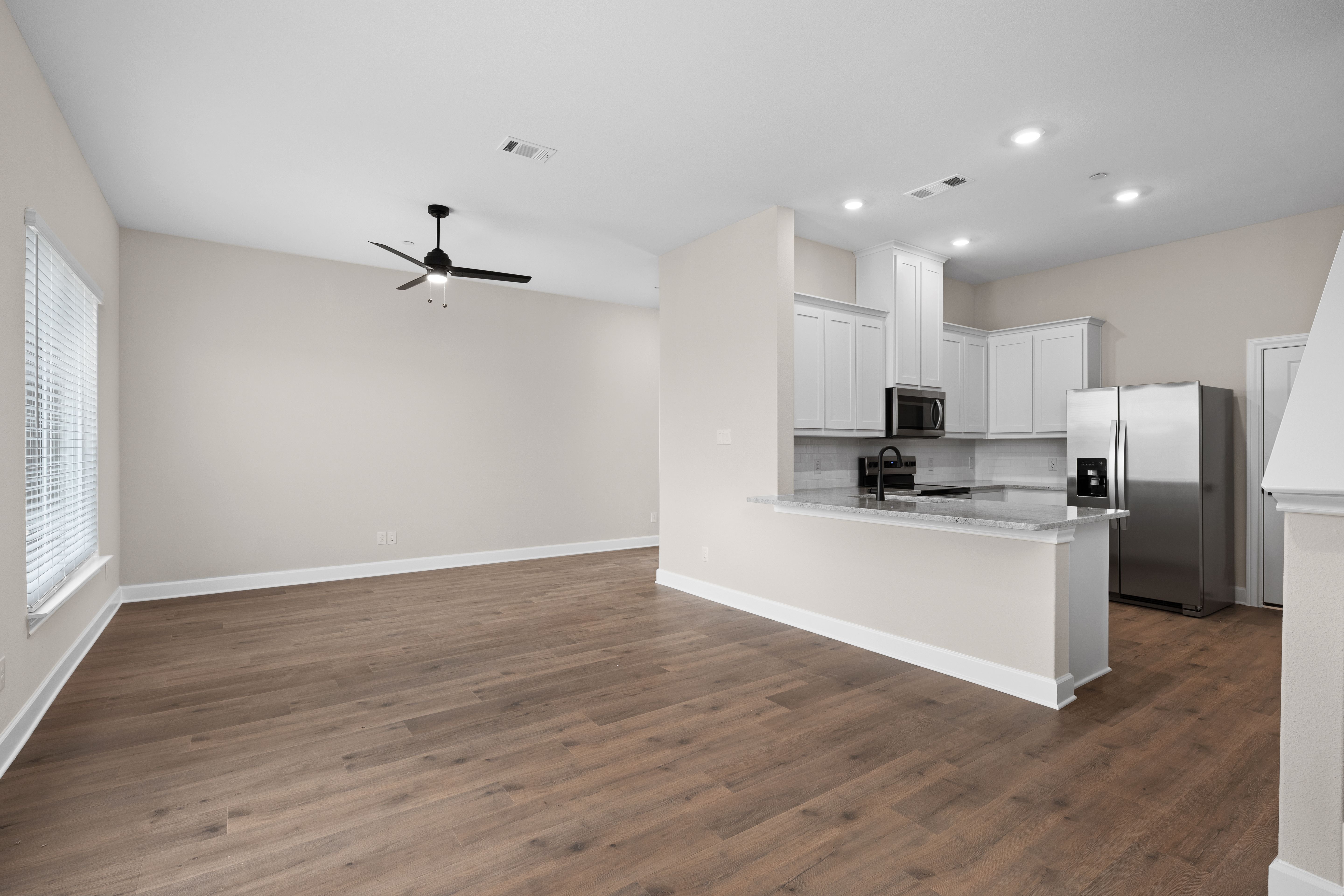 The dining area has large windows that let in great, natural light.